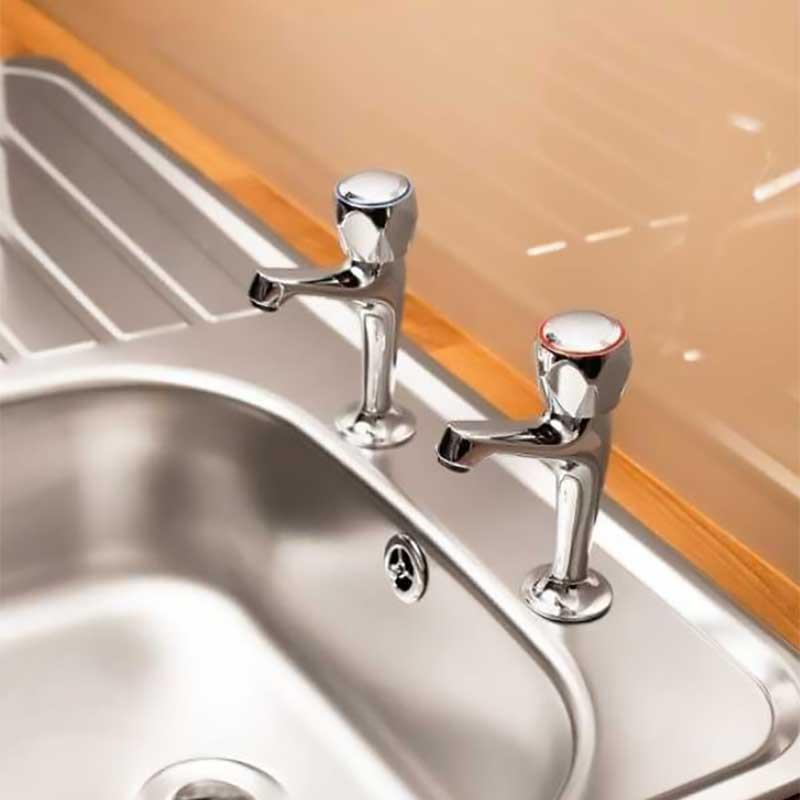 Pair Of Contract Kitchen Sink Pillar Taps Chrome WRAS Approved fitted view